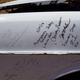 Motorsports Safety Solutions and Austin Toy signed the Datsun’s fender. Photo credit: Motorsports Safety Solutions